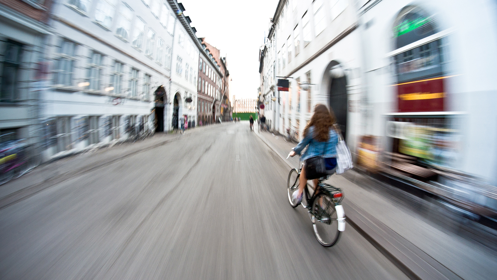 Girl on bike riding fast - motion blur; Shutterstock ID 119830294; PO: New Kids Website