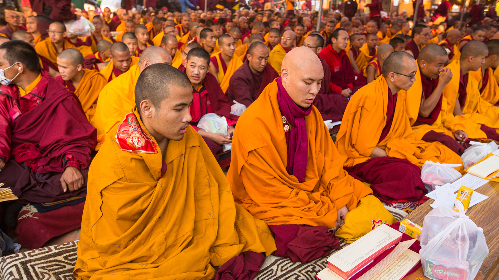 KHATMANDU, NEPAL - DEC 15: Unidentified tibetan Buddhist monks near stupa Boudhanath during festive Puja of H.H. Drubwang Padma Norbu Rinpoche's reincarnation's, Dec 15, 2013 in Khatmandu, Nepal.; Shutterstock ID 167700776; PO: Kids Website for March; Job: Hillary Leo; Client: KIDS WEB