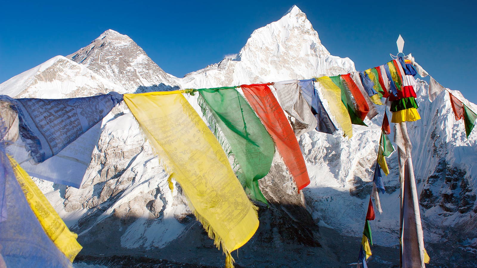 view of Everest with buddhist prayer flags from kala patthar; Shutterstock ID 104980841; PO: Kids Website for March; Job: Hillary Leo; Client: KIDS WEB