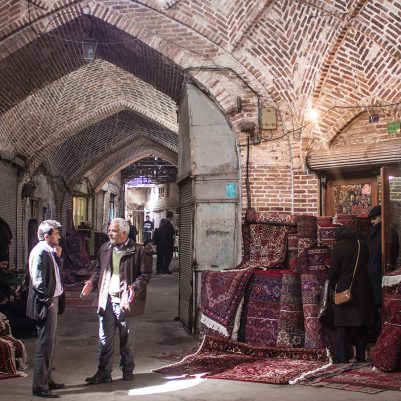 TABRIZ, IRAN - MARCH 10: People in a bazaar on March 10, 2013 in Tabriz, Iran. Bazaar of Tabriz was inscribed as World Heritage Site by UNESCO in July 2010.; Shutterstock ID 135882587; PO: New Kids Website