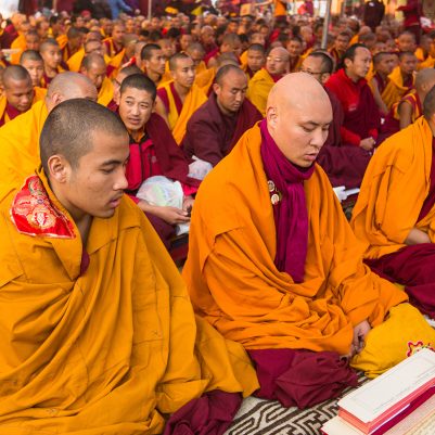 KHATMANDU, NEPAL - DEC 15: Unidentified tibetan Buddhist monks near stupa Boudhanath during festive Puja of H.H. Drubwang Padma Norbu Rinpoche's reincarnation's, Dec 15, 2013 in Khatmandu, Nepal.; Shutterstock ID 167700776; PO: Kids Website for March; Job: Hillary Leo; Client: KIDS WEB