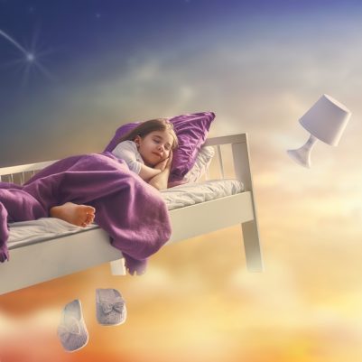 Kids,Dreams.,Cute,Child,Girl,Is,Flying,In,Her,Bed